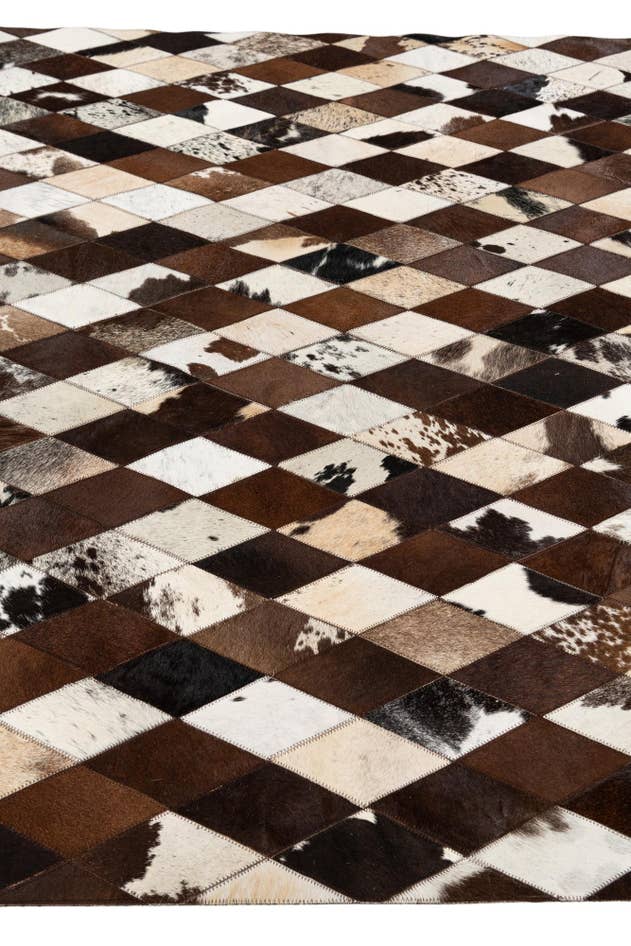 Detail image of 5' 2 x 8' 1 Cowhide Stocks Rug