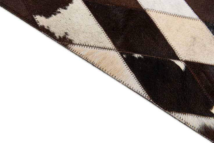 Detail image of 5' 2 x 8' 1 Cowhide Stocks Rug