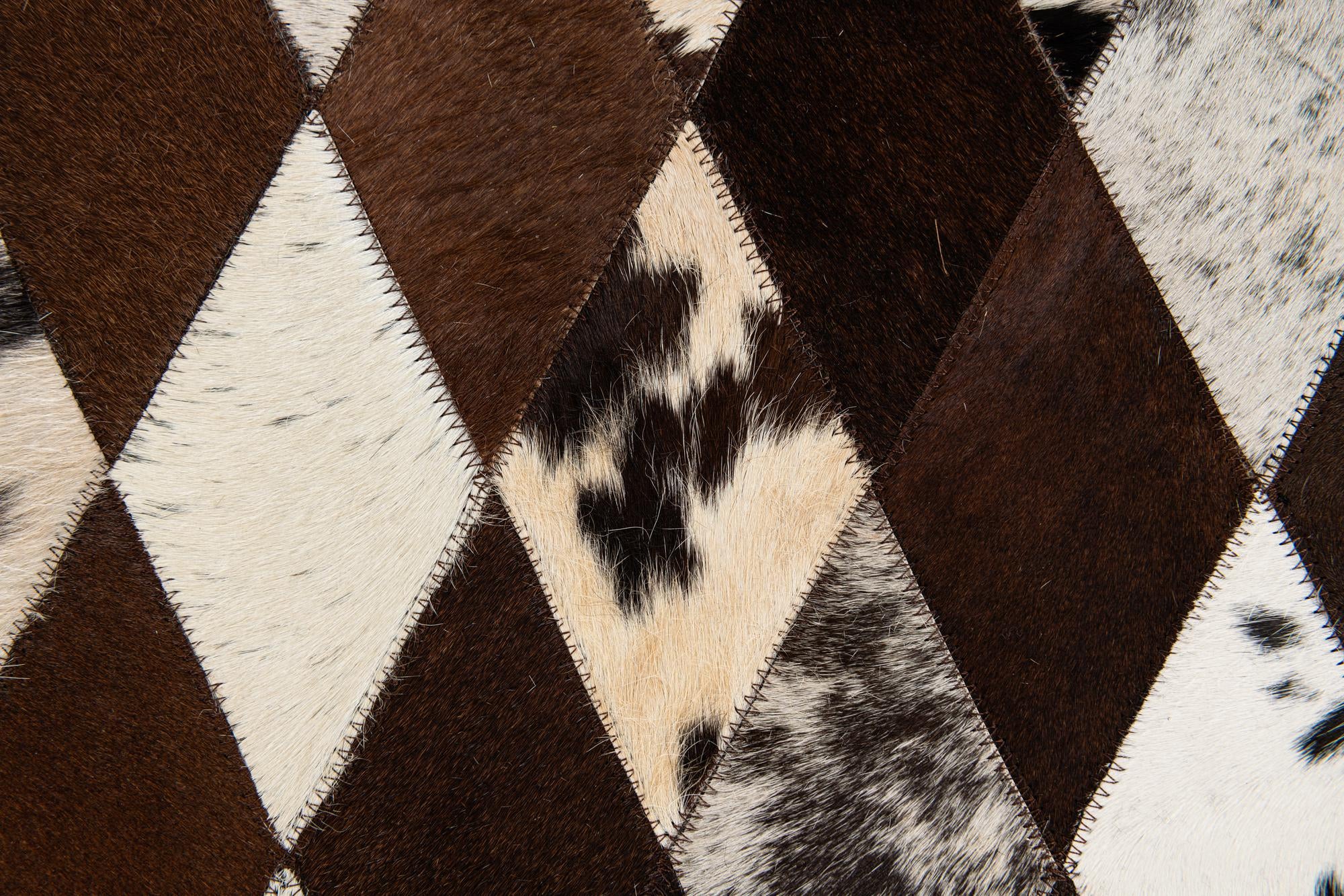 5' 2 x 8' 1 Cowhide Stocks Rug