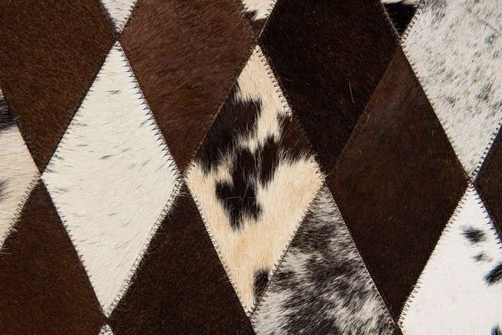 5' 2 x 8' 1 Cowhide Stocks Rug