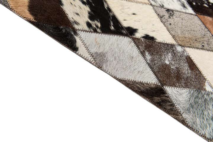 5' x 8' Cowhide Stocks Rug