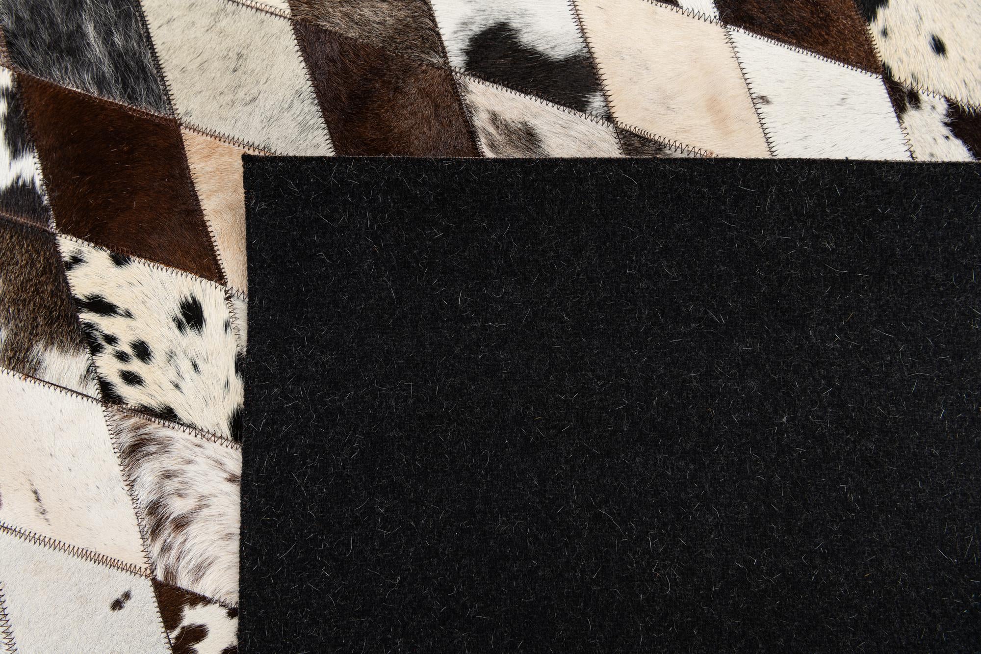 5' x 8' Cowhide Stocks Rug