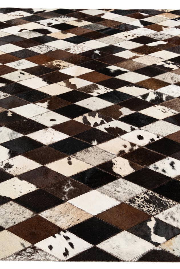 Detail image of 5' 2 x 8' Cowhide Stocks Rug