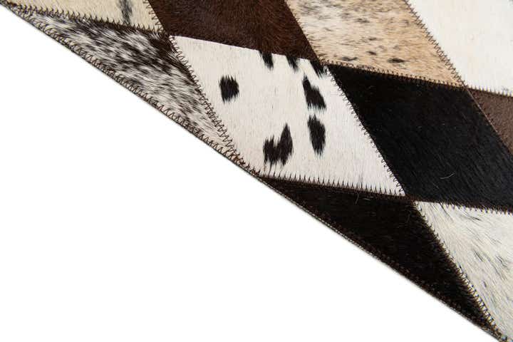 5' 2 x 8' Cowhide Stocks Rug