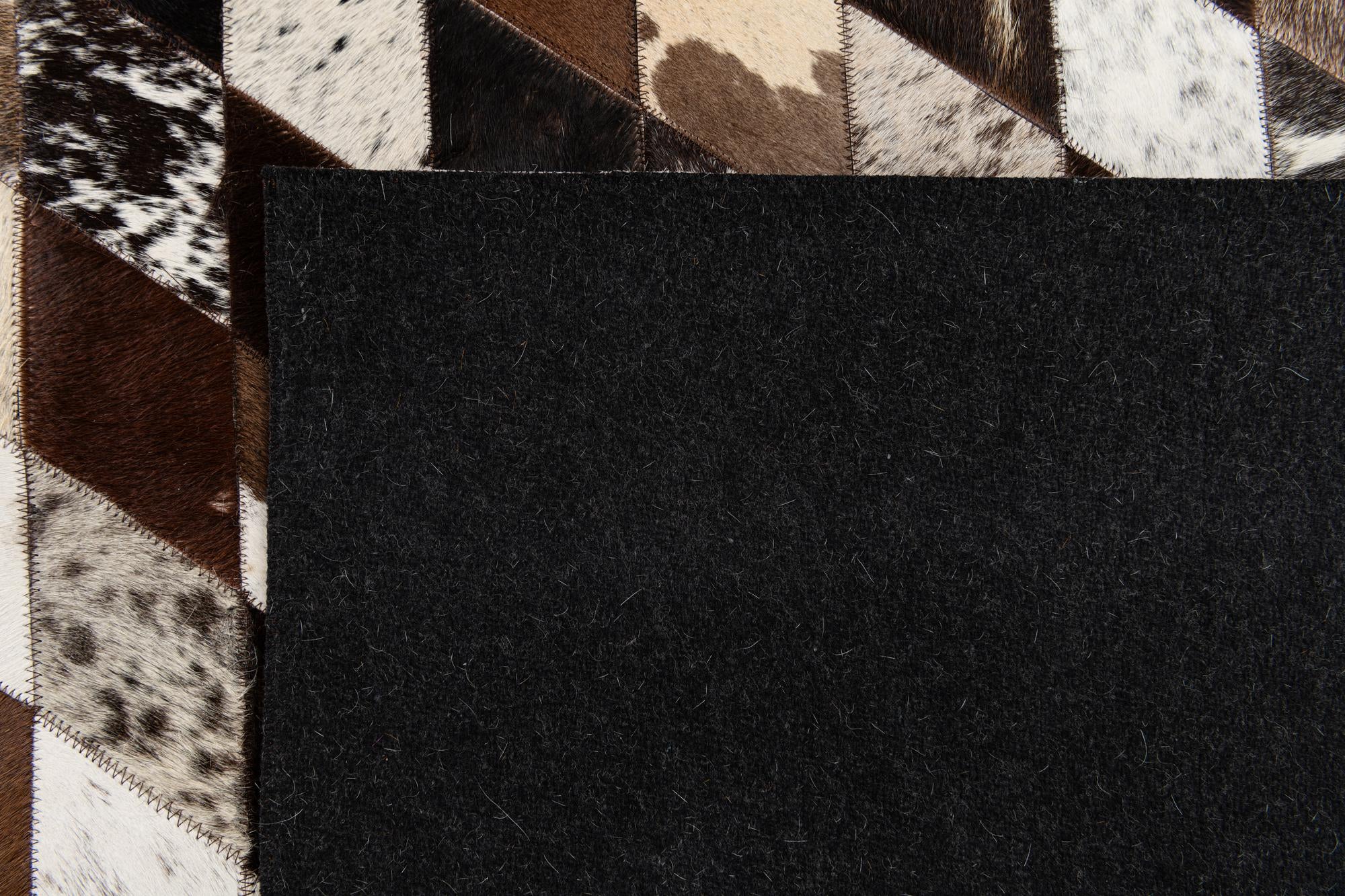 5' 2 x 8' Cowhide Stocks Rug