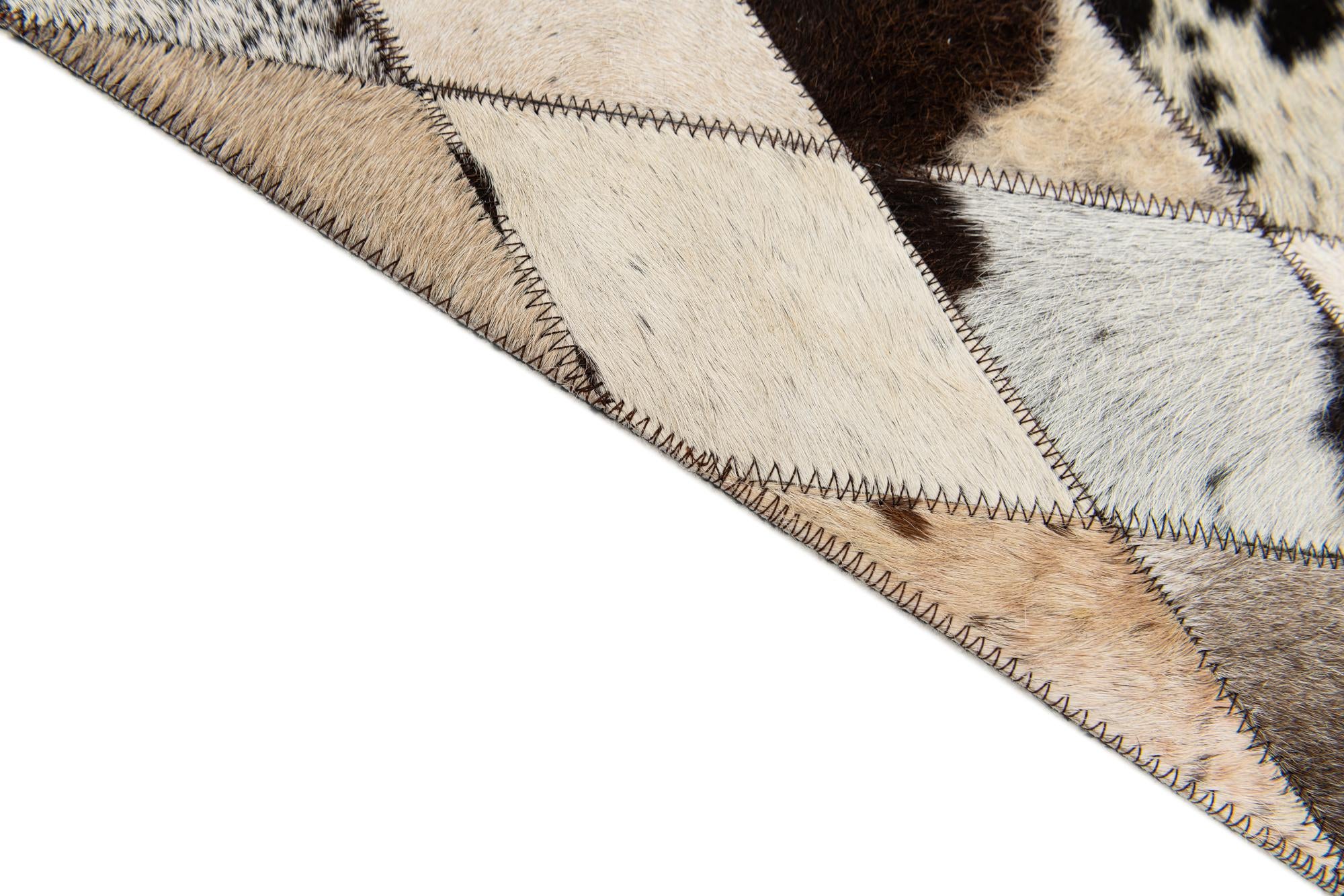 5' x 8' Cowhide Stocks Rug