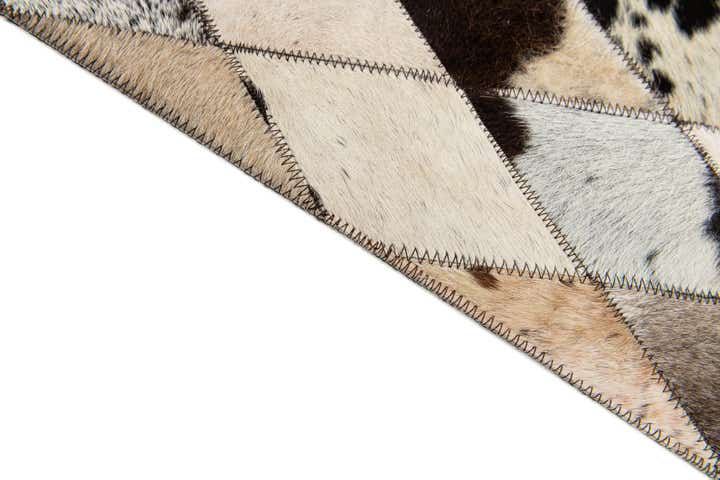 5' x 8' Cowhide Stocks Rug