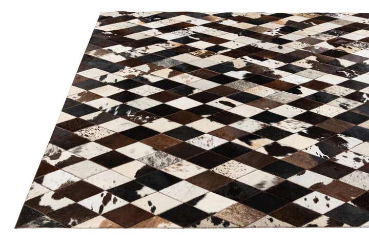 5' 2 x 8' 1 Cowhide Stocks Rug