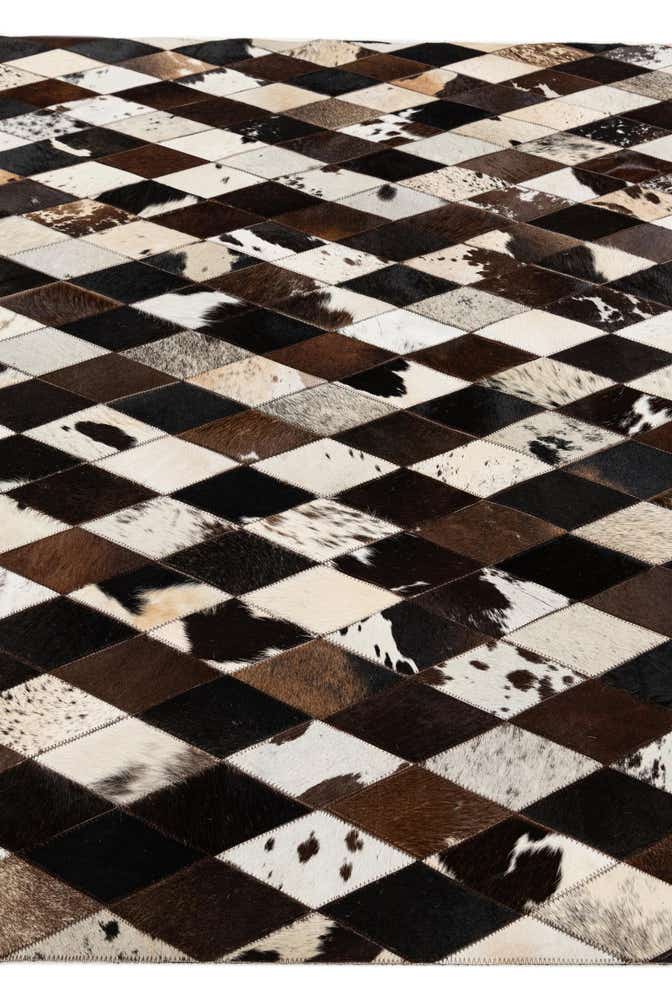 5' 2 x 8' 1 Cowhide Stocks Rug