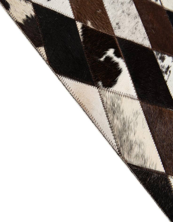 Detail image of 5' 2 x 8' 1 Cowhide Stocks Rug
