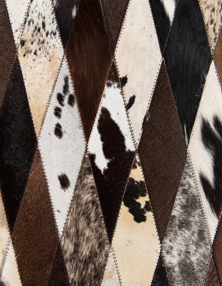 Detail image of 5' 2 x 8' 1 Cowhide Stocks Rug