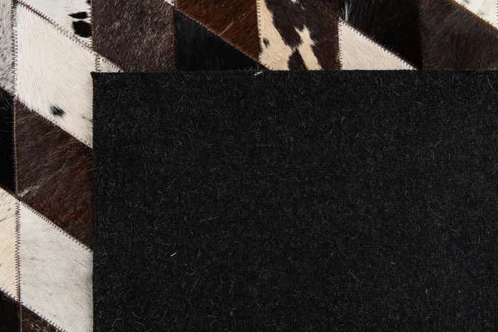 5' 2 x 8' 1 Cowhide Stocks Rug