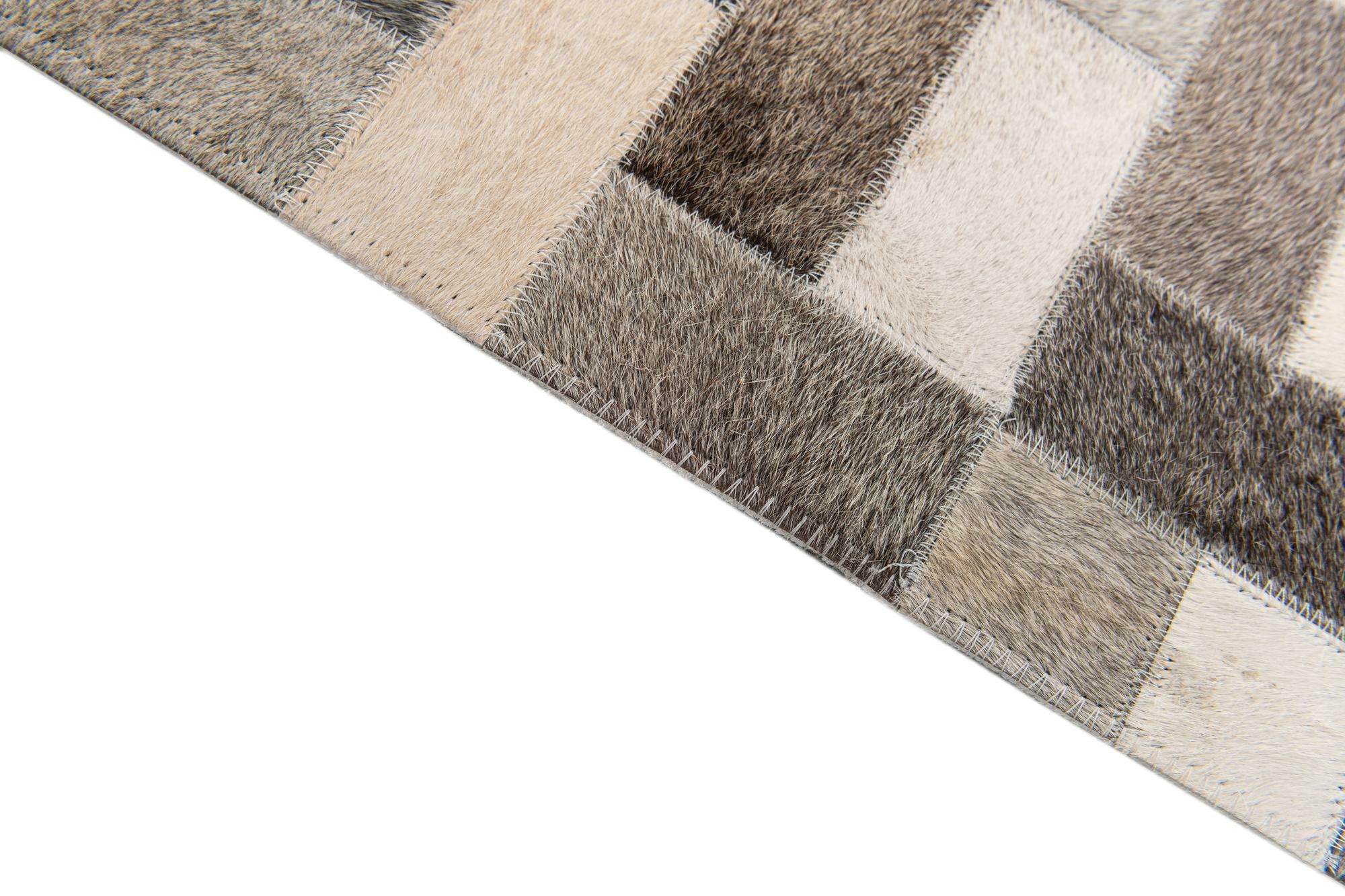 5' 1 x 8' Cowhide Stocks Rug