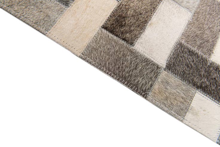 Detail image of 5' 1 x 8' Cowhide Stocks Rug