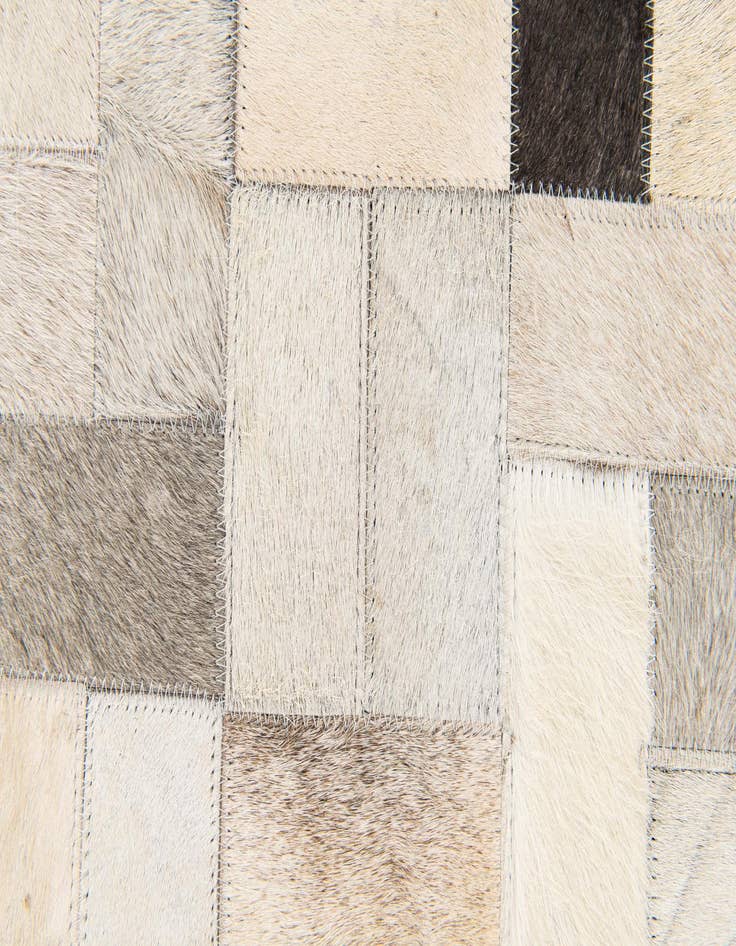 Detail image of 5' x 7' 11 Cowhide Stocks Rug