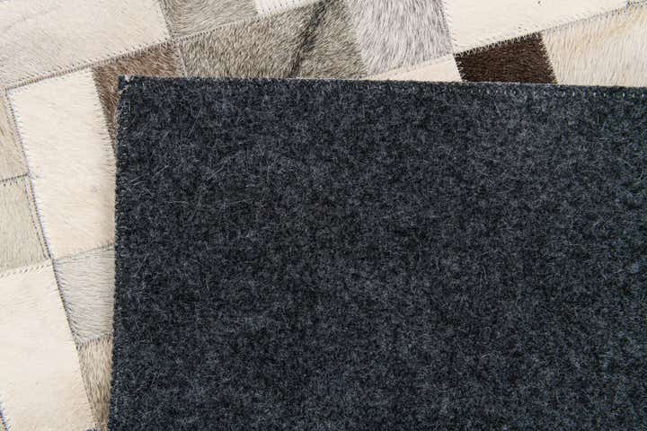 5' x 7' 11 Cowhide Stocks Rug