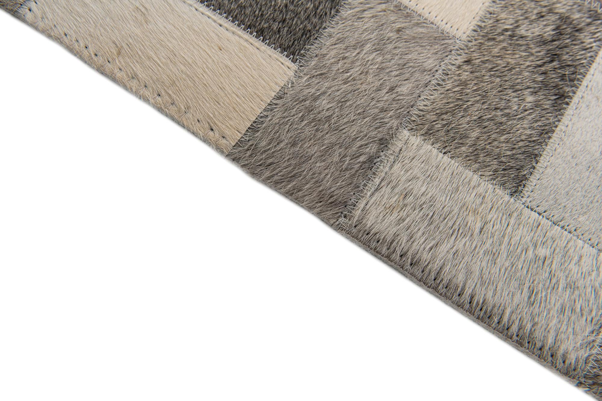 5' 1 x 8' Cowhide Stocks Rug