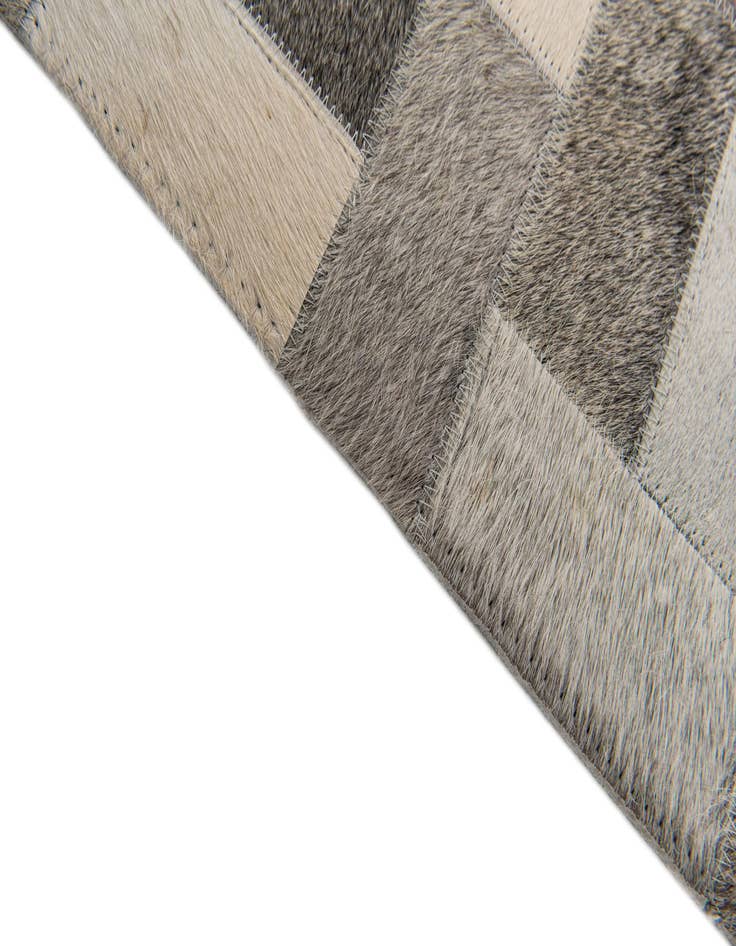 Detail image of 5' 1 x 8' Cowhide Stocks Rug