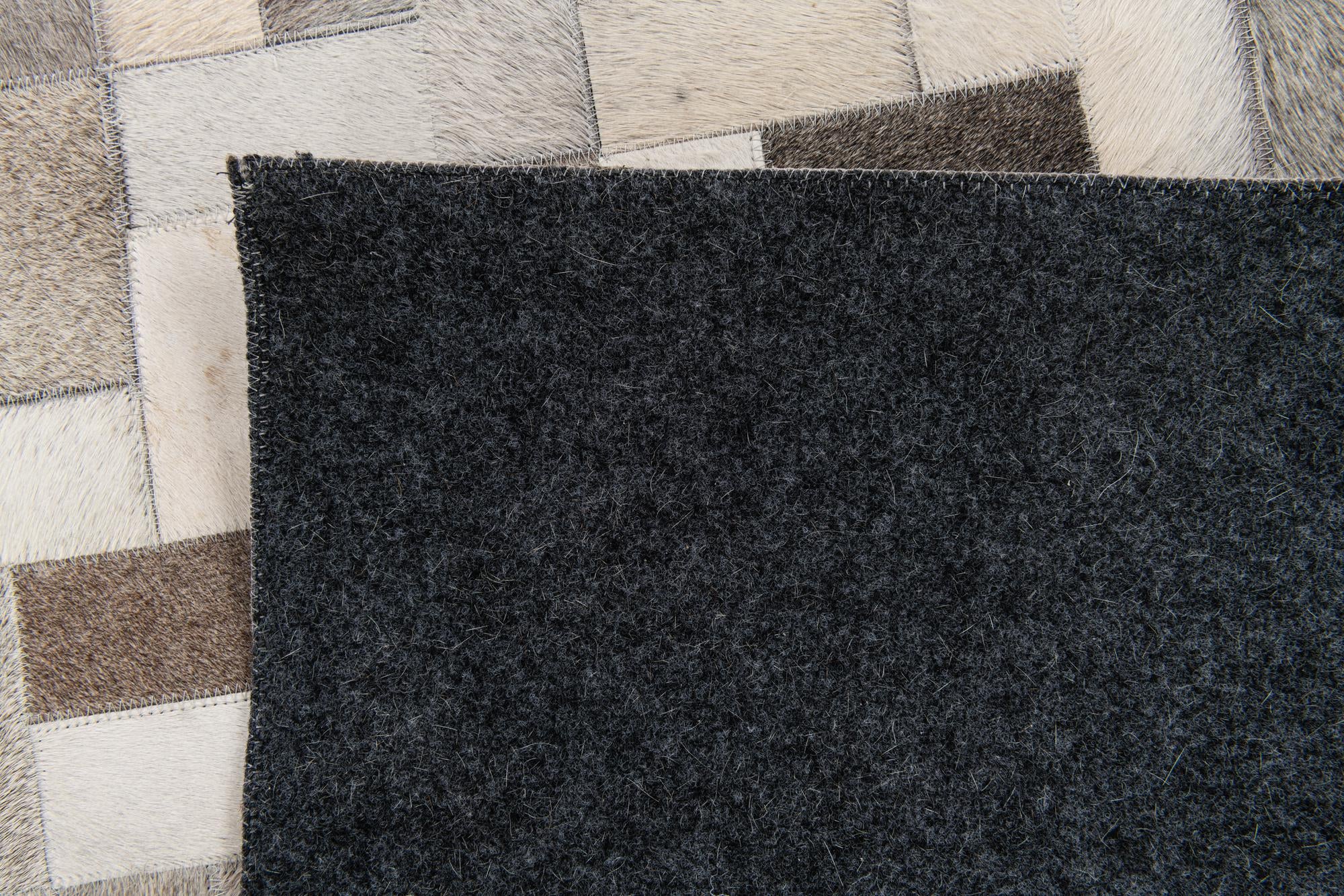 5' 1 x 8' Cowhide Stocks Rug