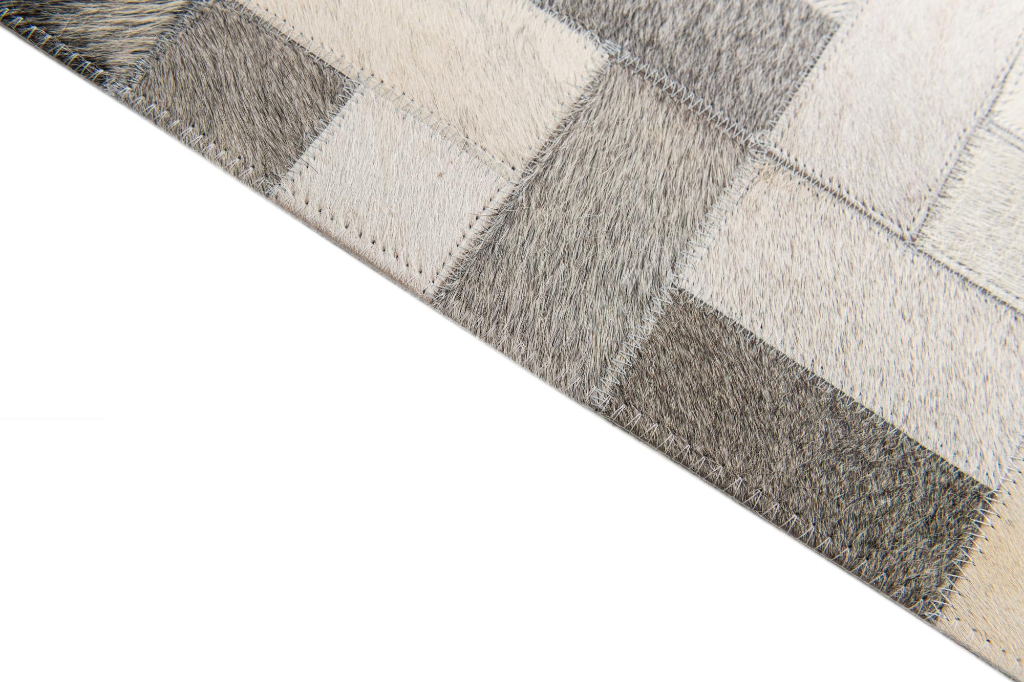 5' 1 x 8' Cowhide Stocks Rug