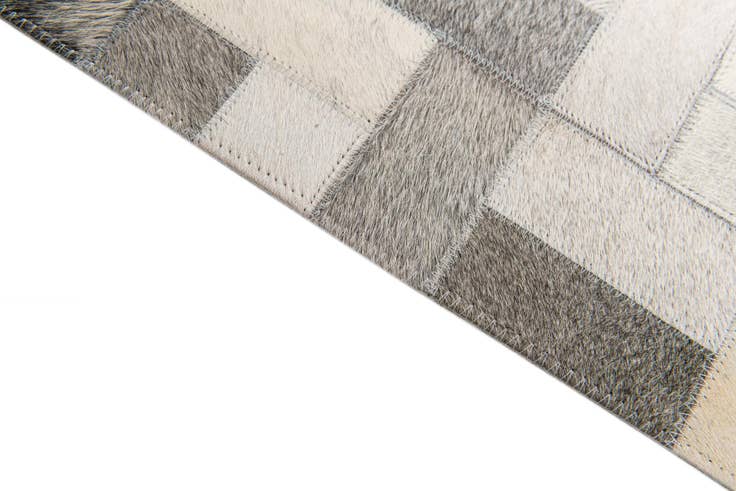 Detail image of 5' 1 x 8' Cowhide Stocks Rug