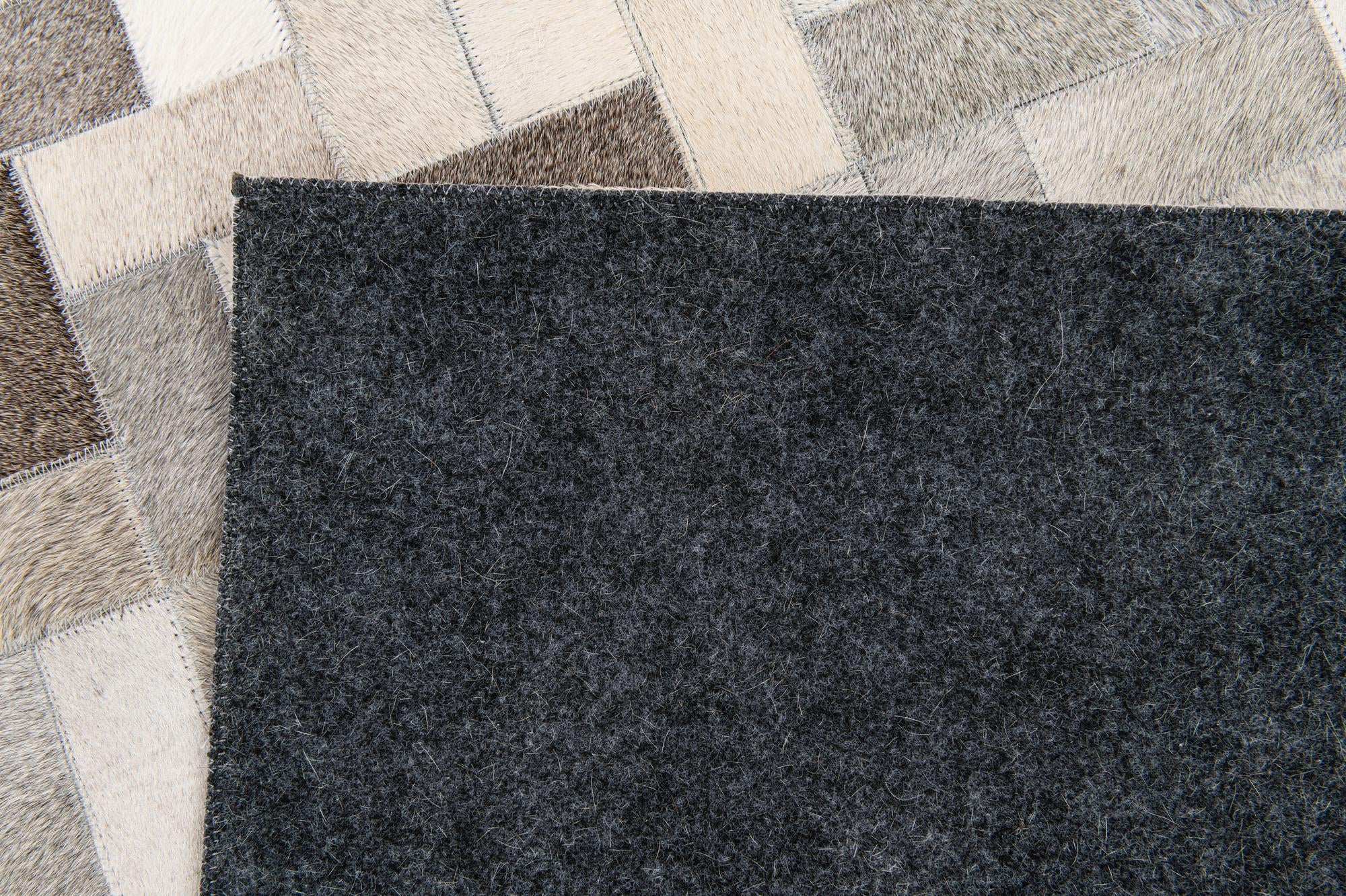 5' 1 x 8' Cowhide Stocks Rug