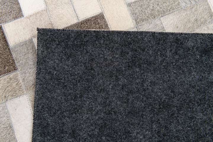 5' 1 x 8' Cowhide Stocks Rug