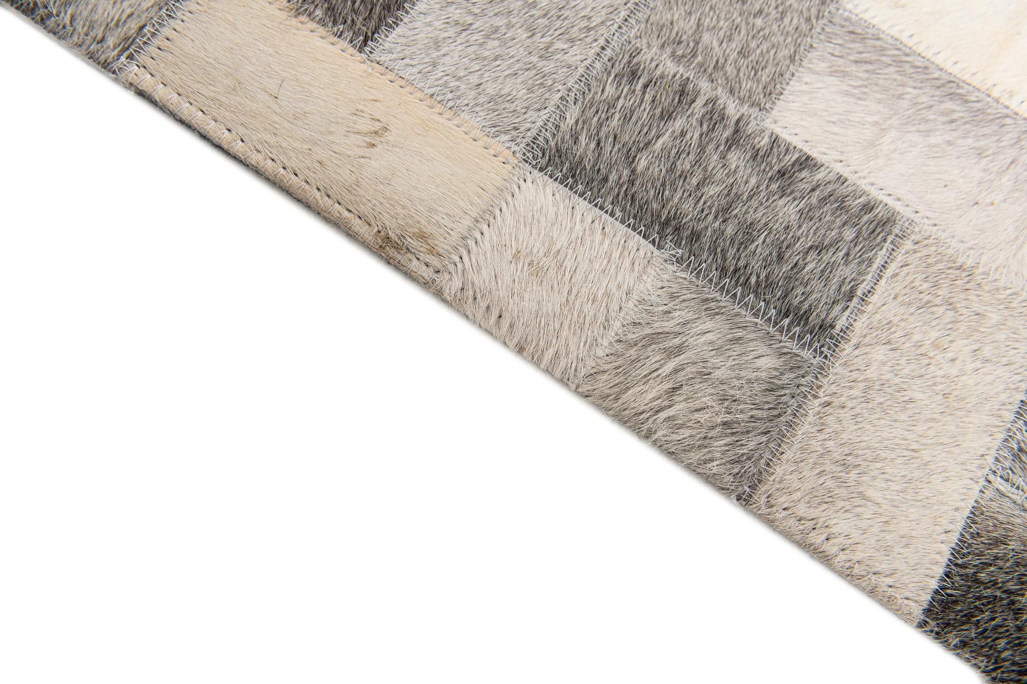 5' x 8' Cowhide Stocks Rug