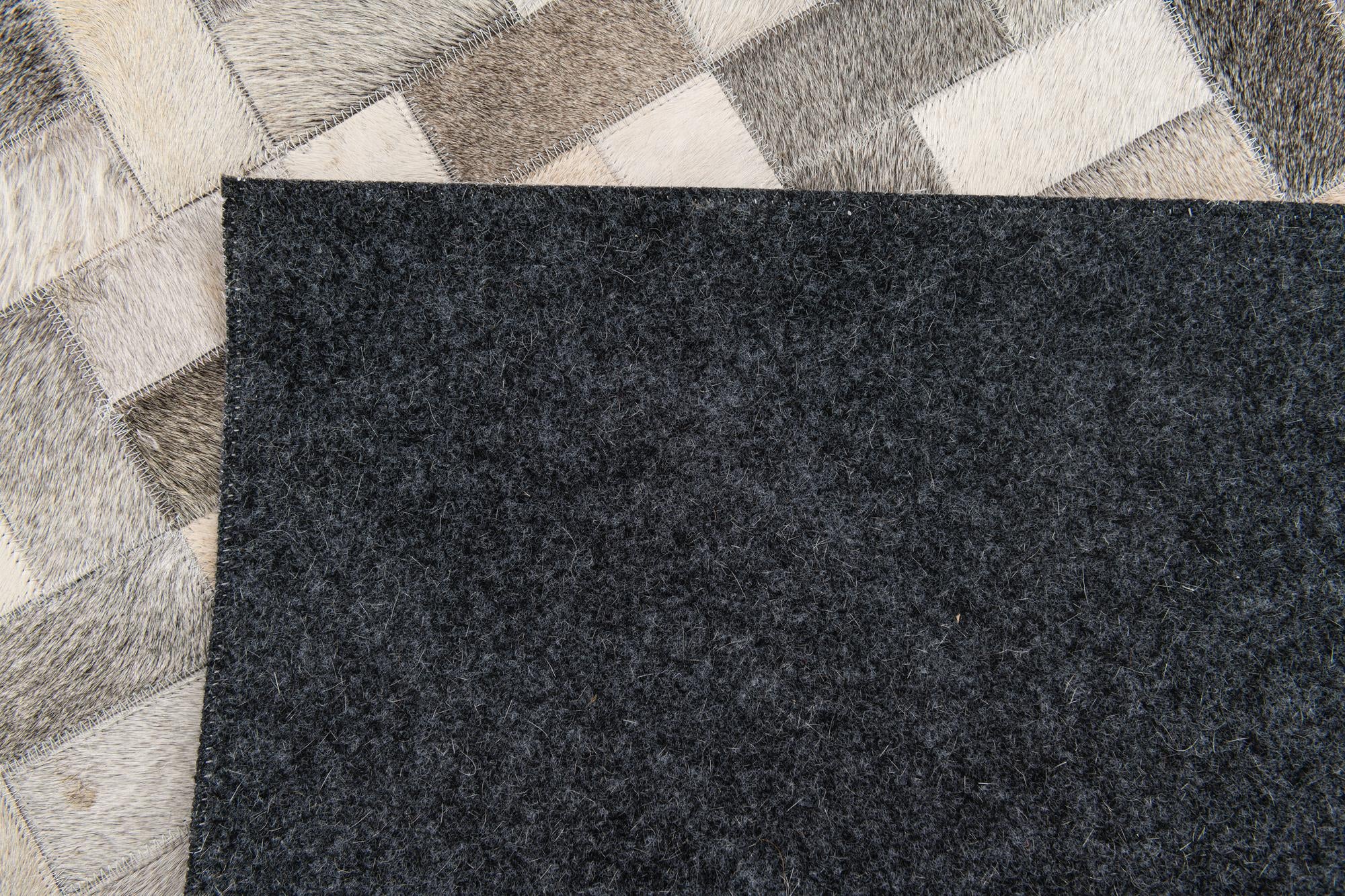 5' x 8' Cowhide Stocks Rug