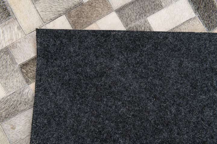 5' x 8' Cowhide Stocks Rug