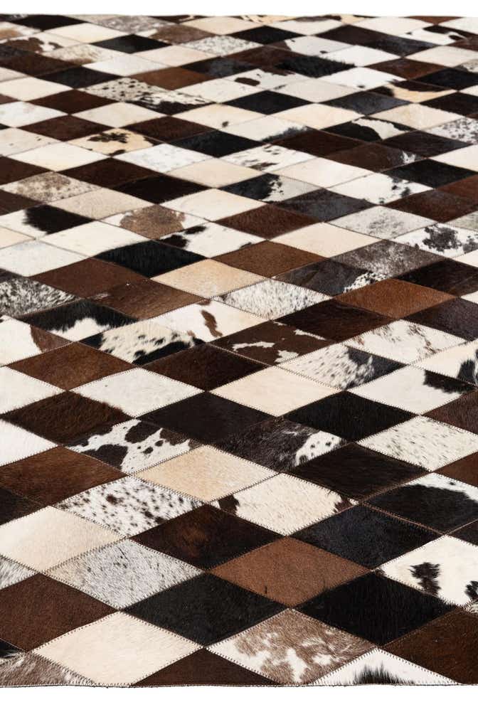 5' 1 x 8' 1 Cowhide Stocks Rug