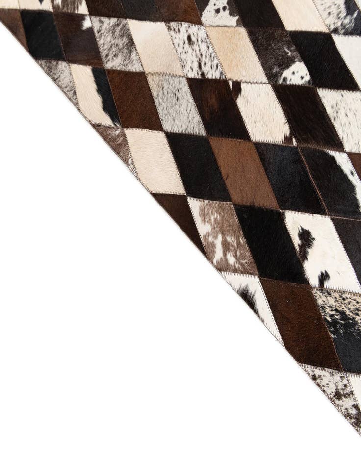 Detail image of 5' 1 x 8' 1 Cowhide Stocks Rug