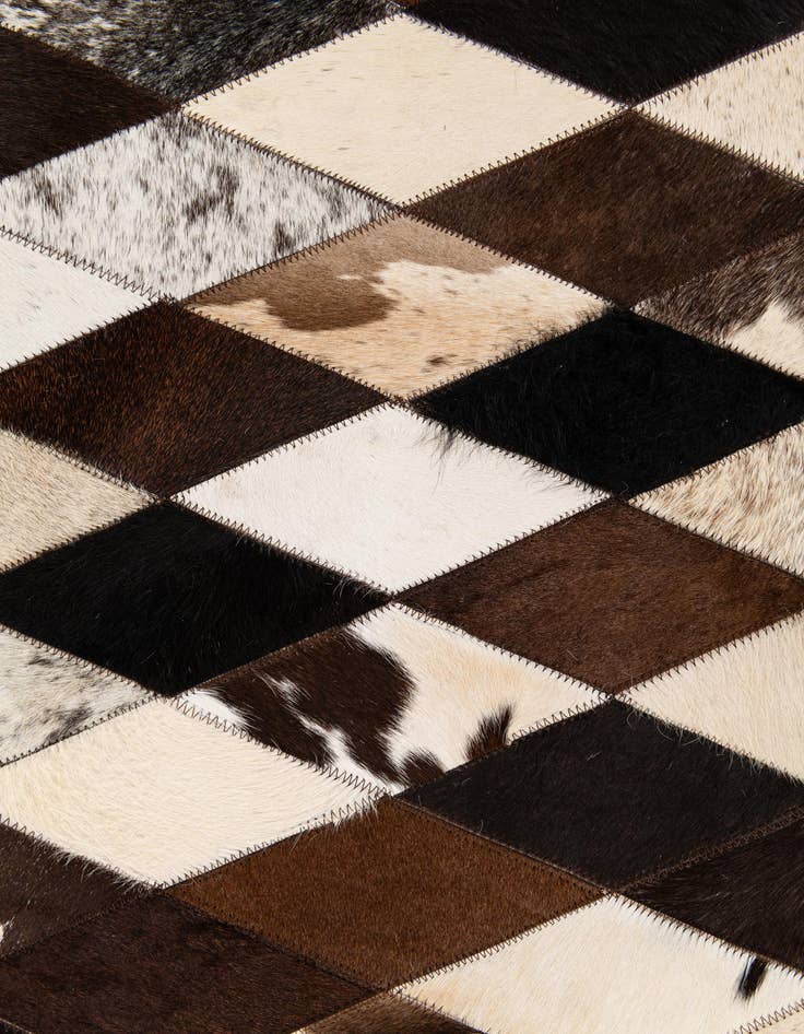 Detail image of 5' 1 x 8' 1 Cowhide Stocks Rug