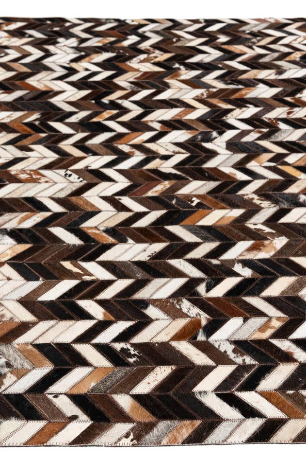 Detail image of 4' 11 x 8' Cowhide Stocks Rug