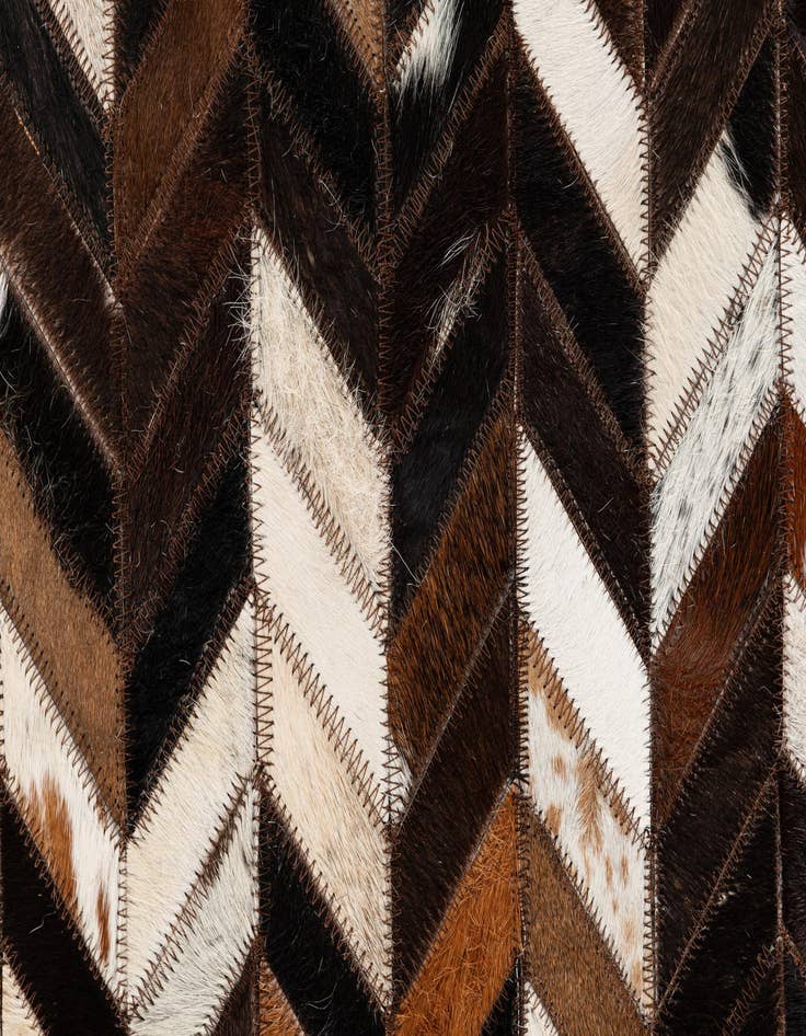 Detail image of 4' 11 x 8' Cowhide Stocks Rug