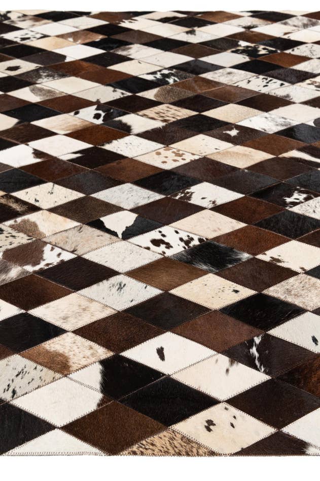 Detail image of 5' 2 x 8' 2 Cowhide Stocks Rug