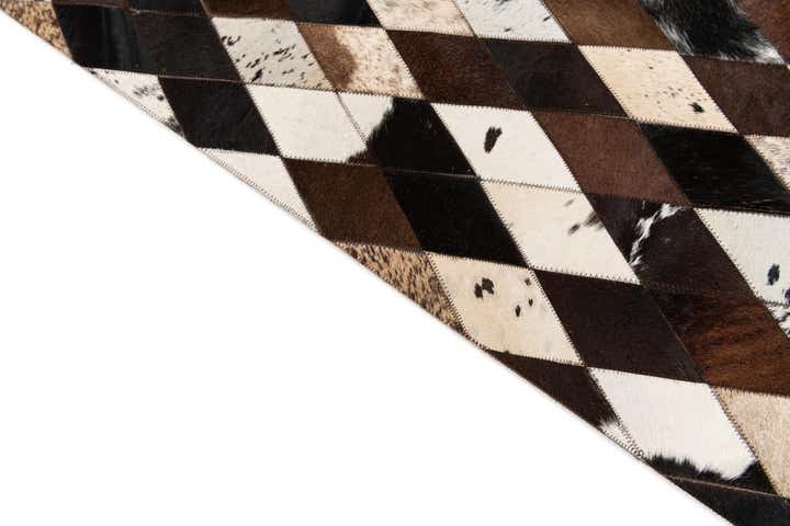 5' 2 x 8' 2 Cowhide Stocks Rug