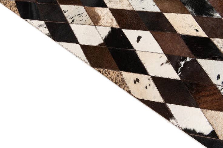 Detail image of 5' 2 x 8' 2 Cowhide Stocks Rug