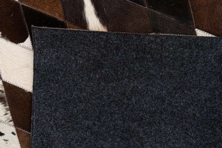 5' 2 x 8' 2 Cowhide Stocks Rug