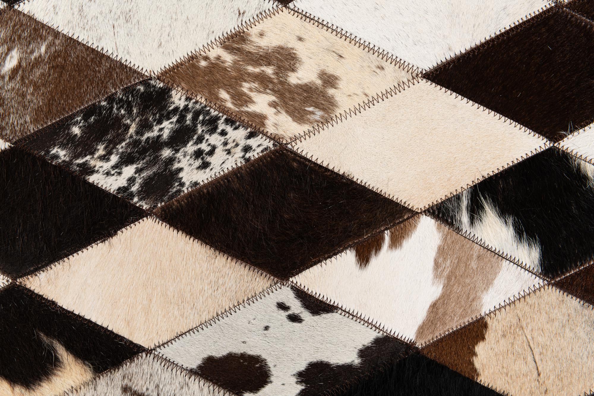 5' 2 x 8' 1 Cowhide Stocks Rug