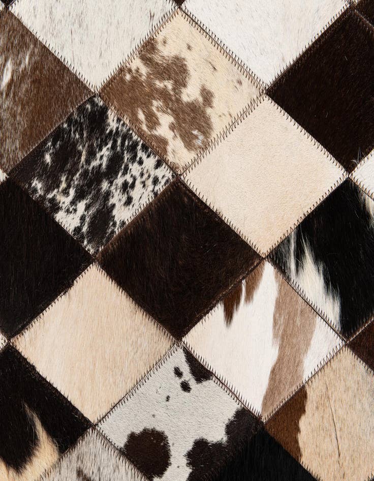 Detail image of 5' 2 x 8' 1 Cowhide Stocks Rug