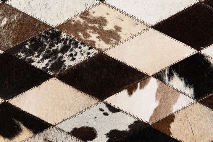 5' 2 x 8' 1 Cowhide Stocks Rug