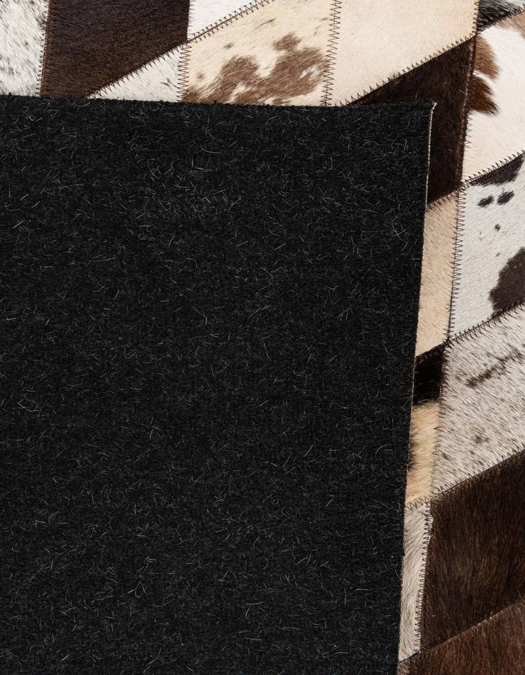 Detail image of 5' 2 x 8' 1 Cowhide Stocks Rug