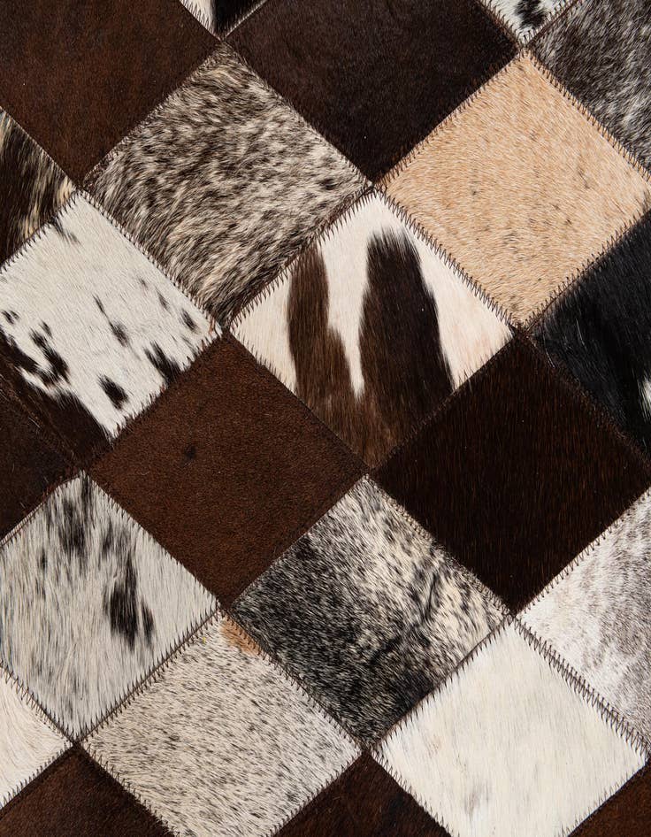 Detail image of 5' 1 x 8' 1 Cowhide Stocks Rug