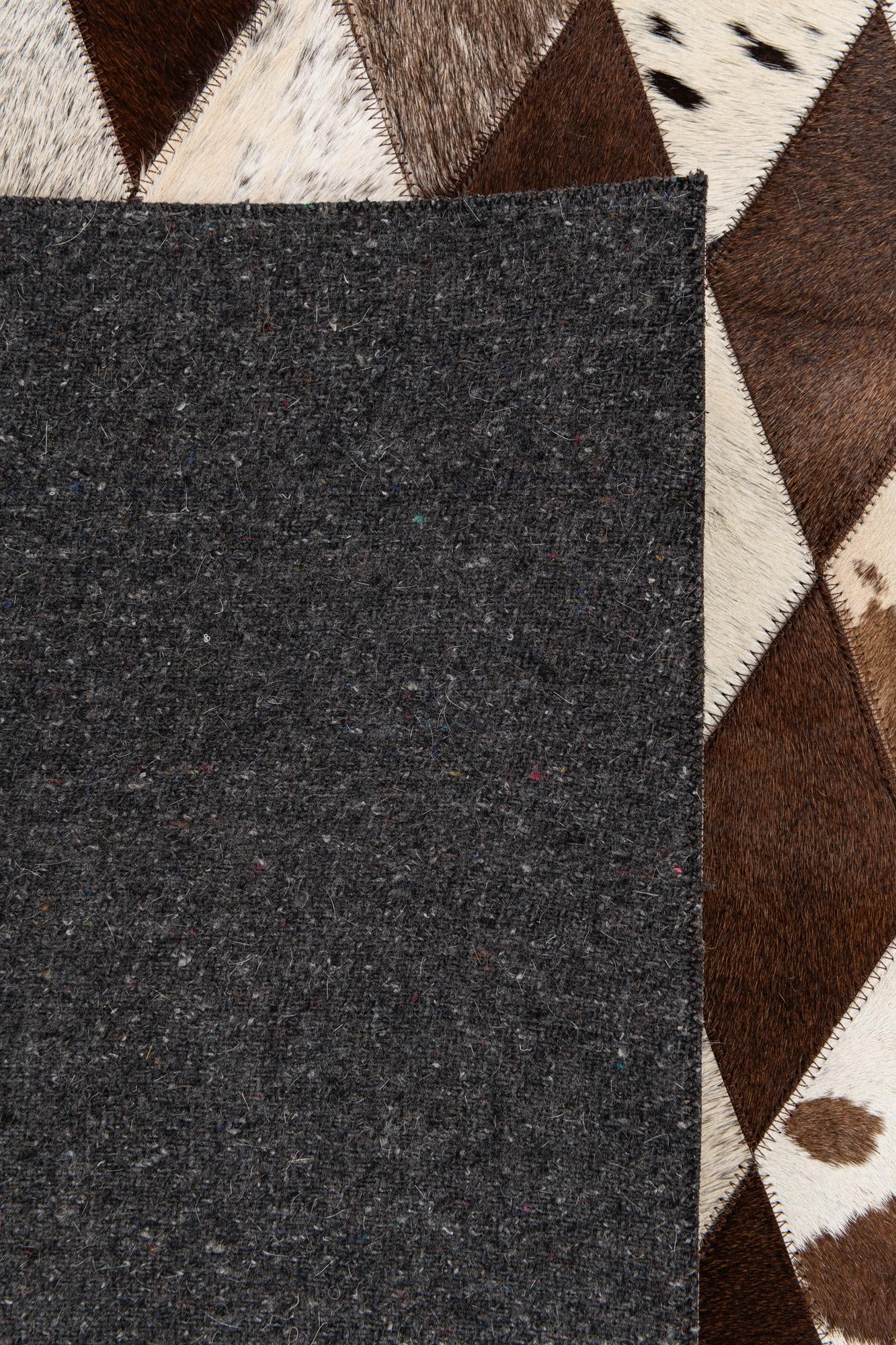 5' 1 x 8' 1 Cowhide Stocks Rug