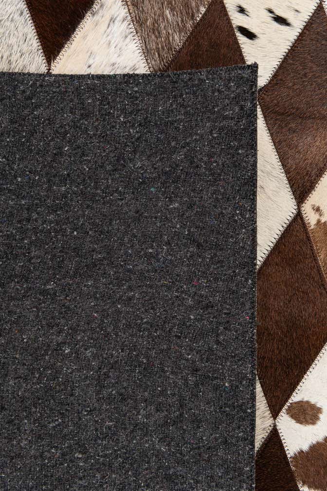5' 1 x 8' 1 Cowhide Stocks Rug