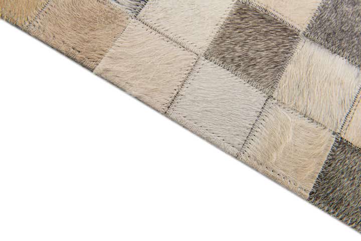 5' 1 x 7' 9 Cowhide Stocks Rug