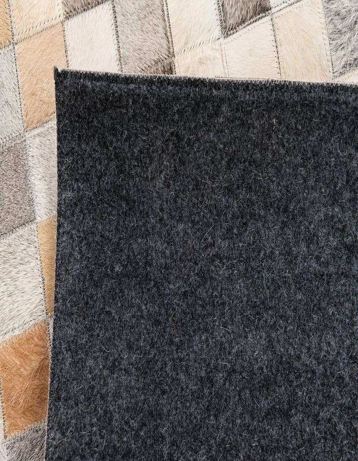 Detail image of 5' 1 x 7' 9 Cowhide Stocks Rug