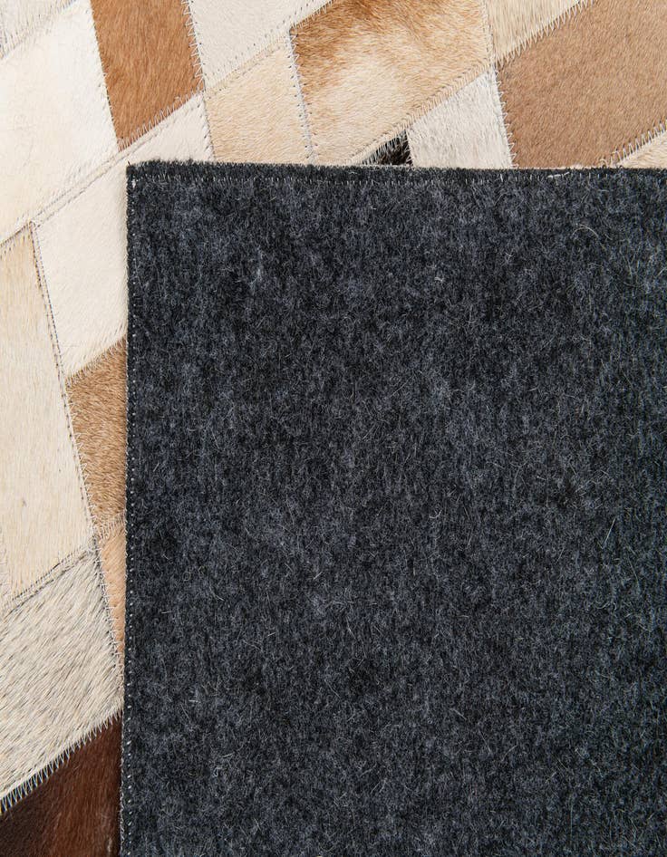 Detail image of 5' 1 x 7' 11 Cowhide Stocks Rug