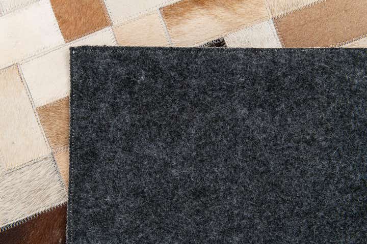 5' 1 x 7' 11 Cowhide Stocks Rug
